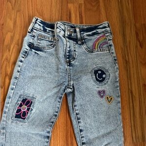 Trendy Blue Jeans with Colorful Patches